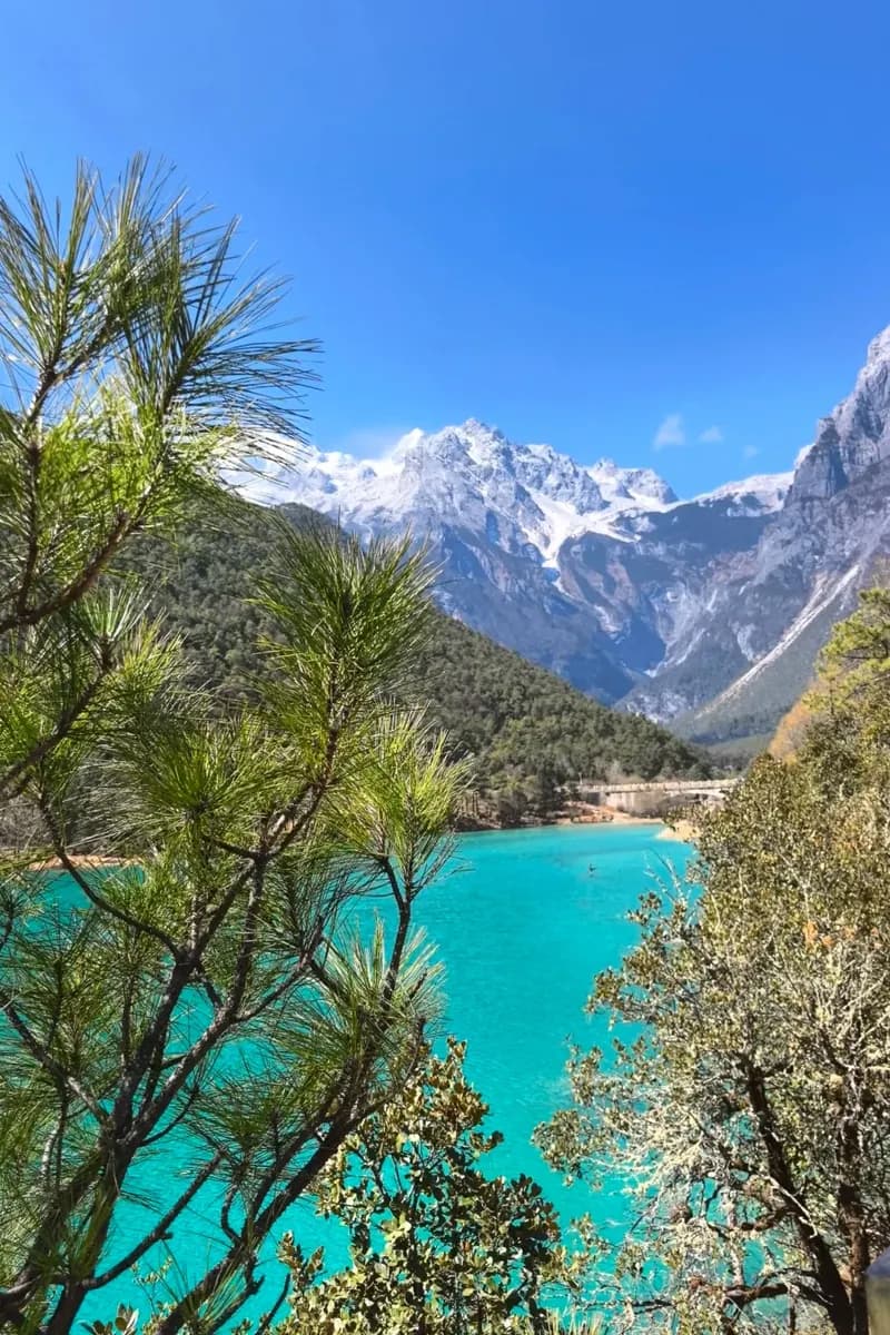 Turquoise Blue Moon Valley below snow peaks of Jade Dragon