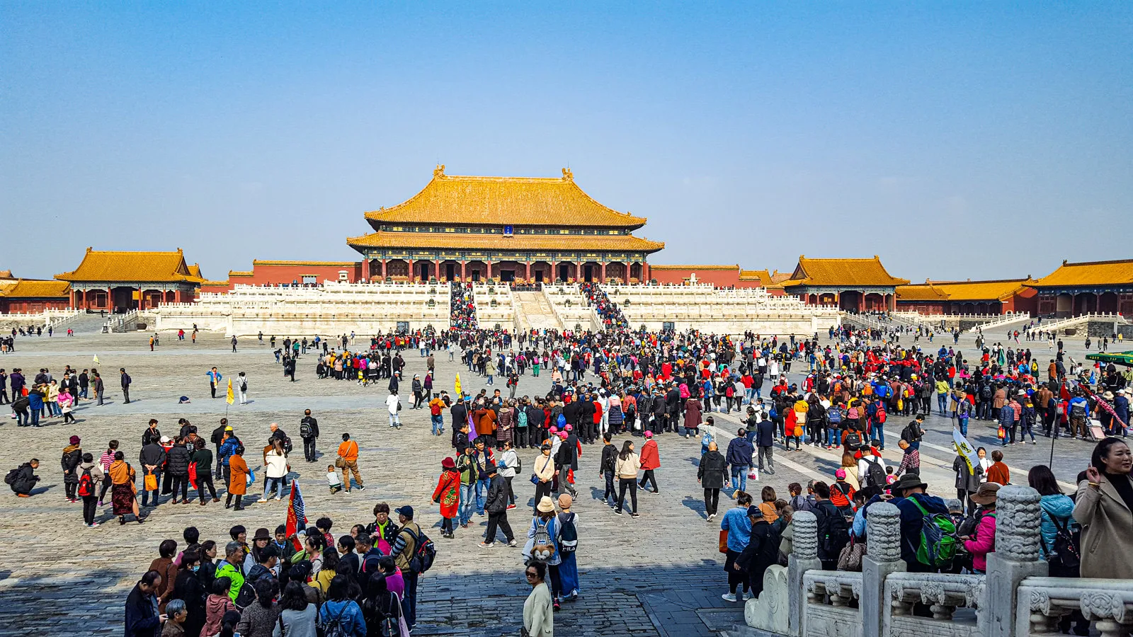 Forbidden City entrance in Beijing with tourists and ticket reservation required for entry