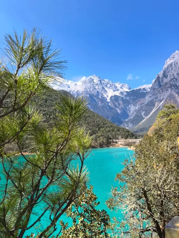 Jade Dragon Snow Mountain above a turquoise lake