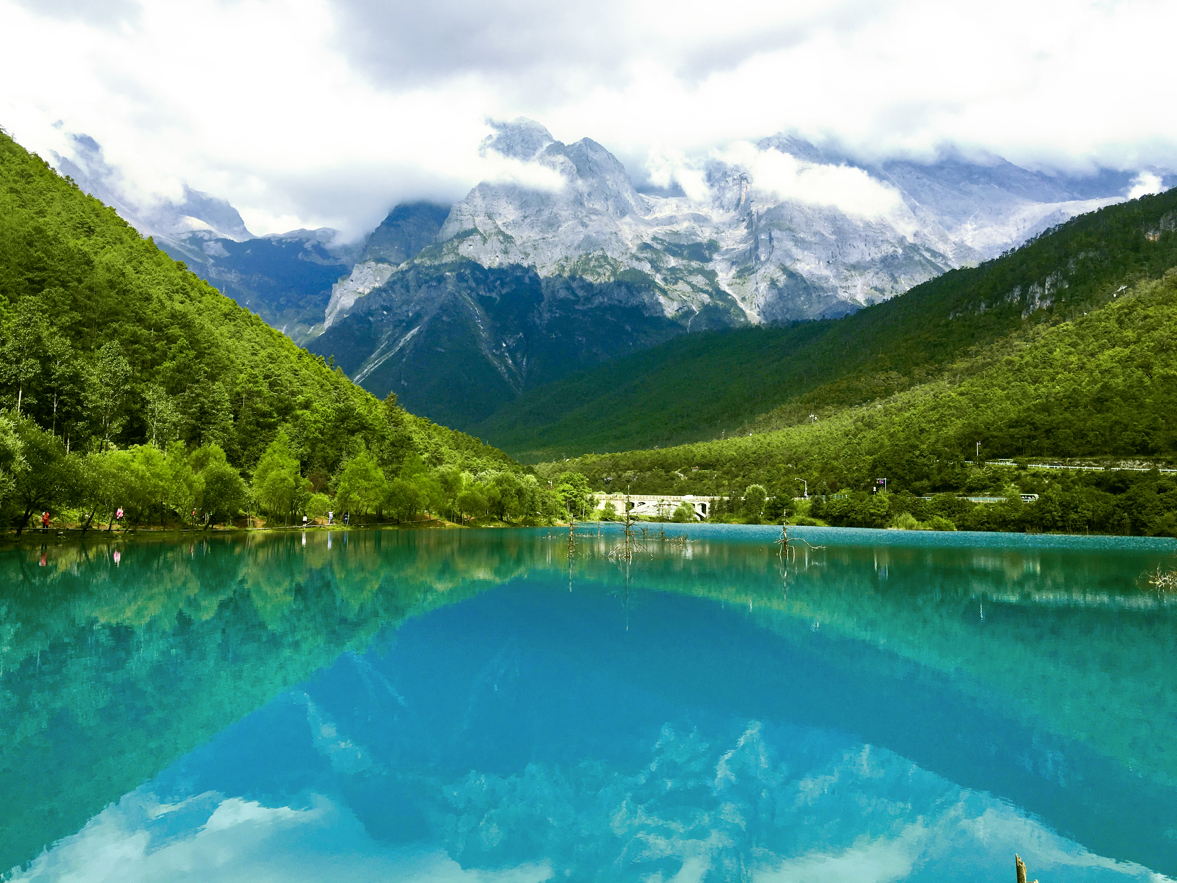 Stand beneath Jade Dragon Snow Mountain
